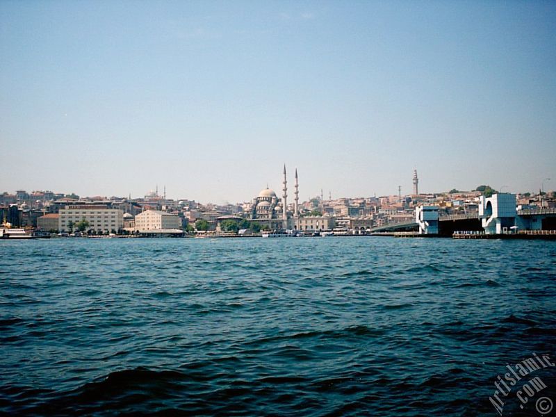 View of Eminonu coast, (from left) Sultan Ahmet Mosque (Blue Mosque), Yeni Cami (Mosque), (at far behind) Beyazit Mosque, Beyazit Tower and Galata Brigde from the shore of Karakoy in Istanbul city of Turkey.
