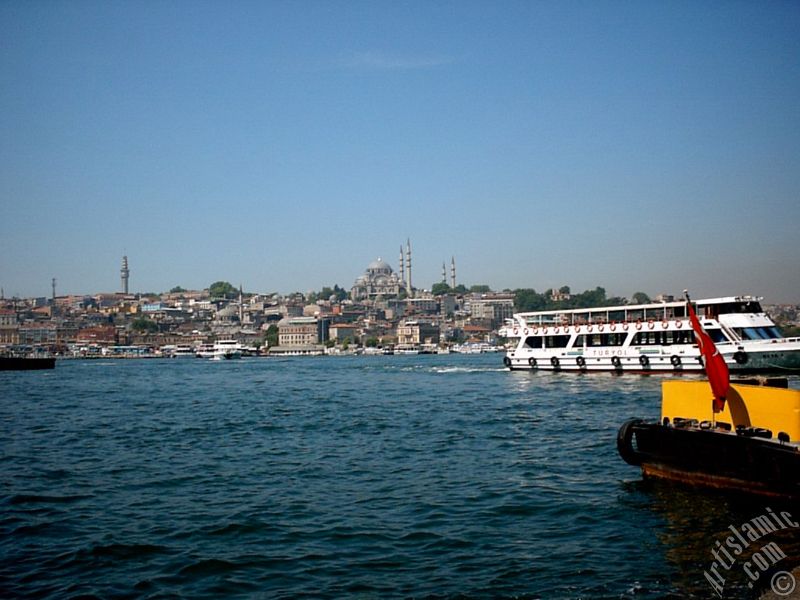 View of Eminonu coast, (from left) Beyazit Tower, (below) Rustem Pasha Mosque and (above) Suleymaniye Mosque from the shore of Karakoy-Persembe Pazari in Istanbul city of Turkey.
