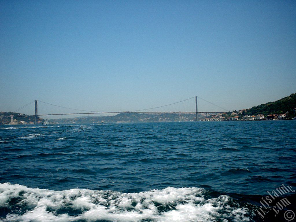 View of Uskudar coast and Bosphorus Bridge from the Bosphorus in Istanbul city of Turkey.

