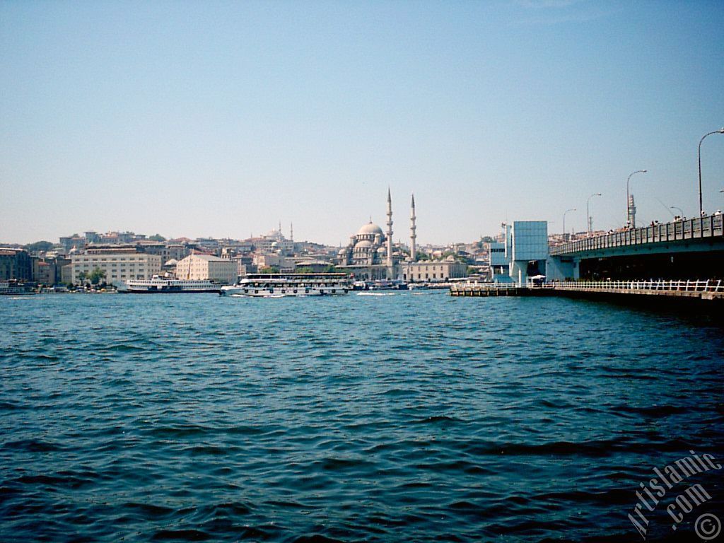 View of Eminonu coast, Sultan Ahmet Mosque and Yeni Cami (Mosque) from the shore of Karakoy in Istanbul city of Turkey.
