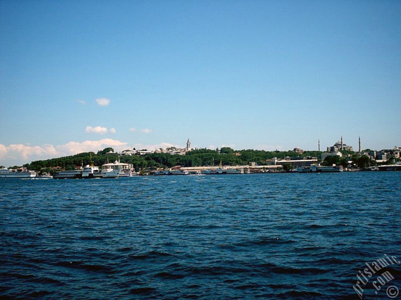 View of Eminonu coast, Ayasofya Mosque (Hagia Sophia) and Topkapi Palace from the shore of Karakoy in Istanbul city of Turkey.
