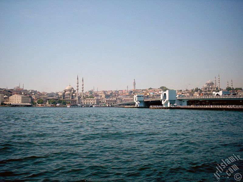 View of Eminonu coast, (from left) Sultan Ahmet Mosque (Blue Mosque), Yeni Cami (Mosque), (at far behind) Beyazit Mosque, Beyazit Tower, Galata Brigde and Suleymaniye Mosque from the shore of Karakoy in Istanbul city of Turkey.
