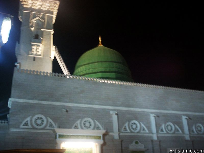 View towards to the green dome (kubbatu`l khadraa) over the Prophet Muhammad`s (saaw) Mosque (Masjed an-Nabawe) in Madina city of Saudi Arabia.
