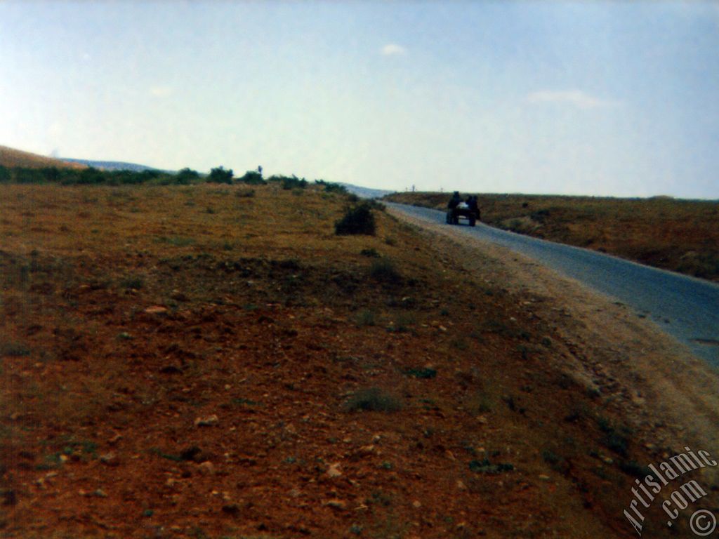 View of a village`s way and villagers on a tractor in Gaziantep city of Turkey.
