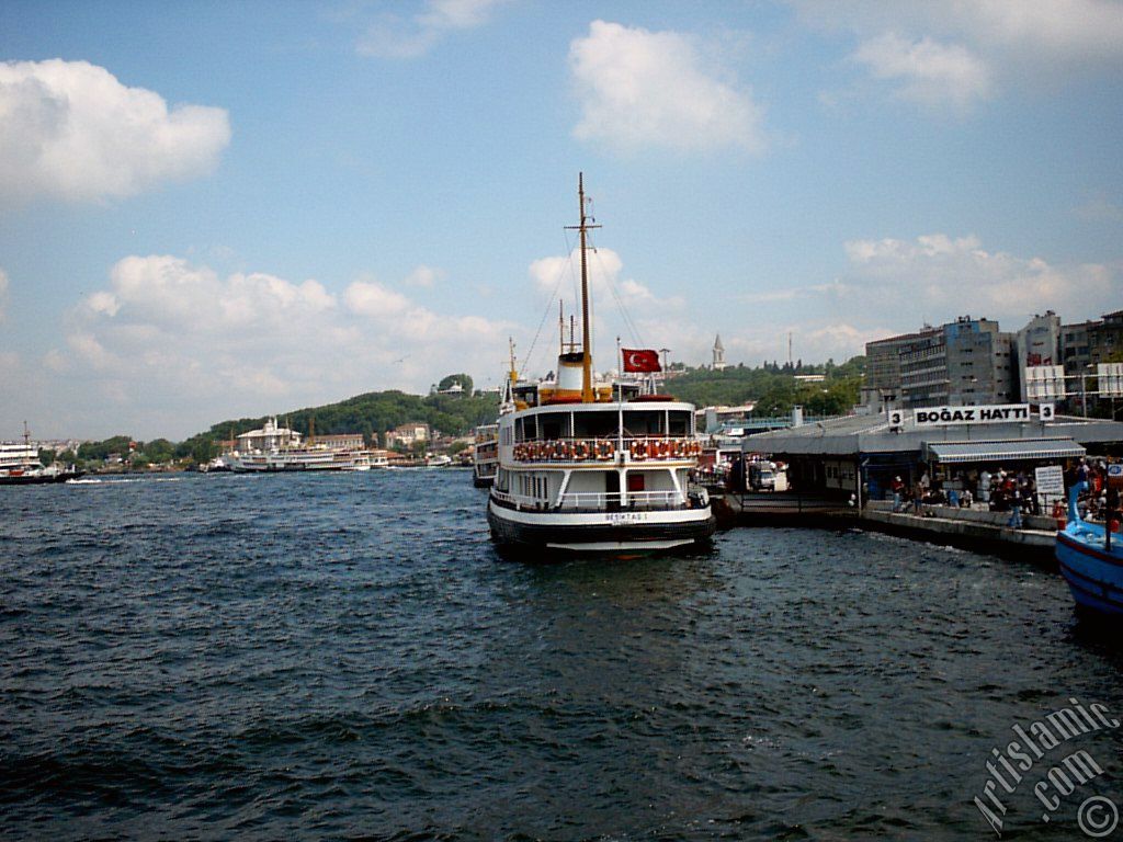 View of Eminonu shore, the jetty and the ships from the sea in Istanbul city of Turkey.
