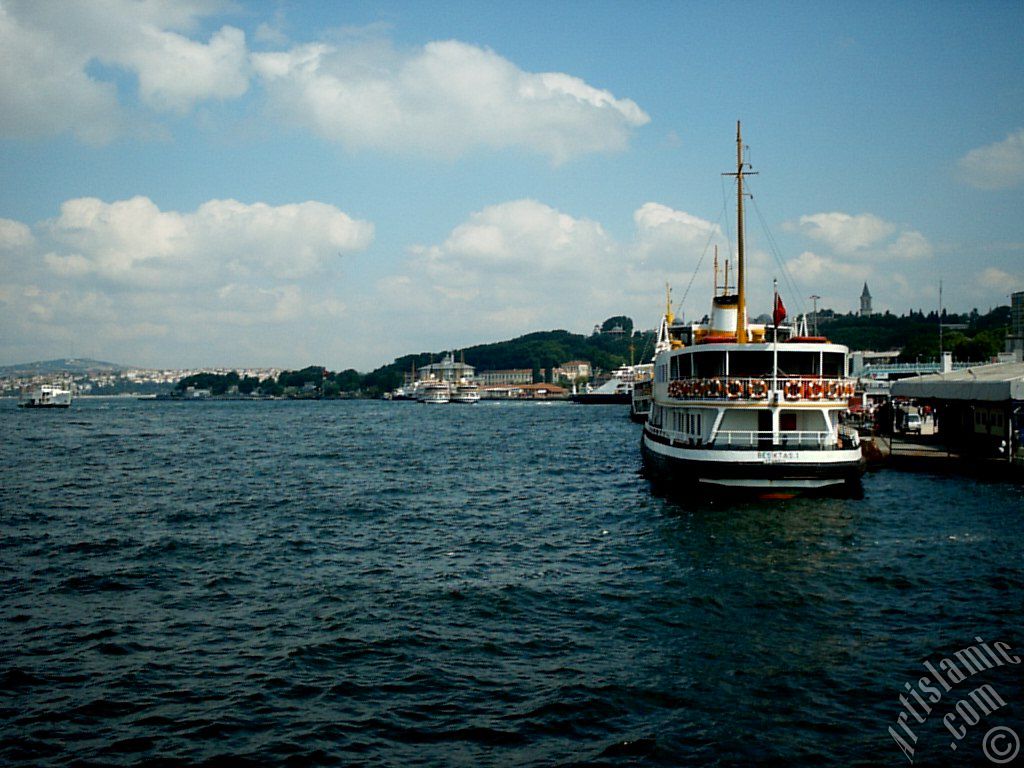 View of Eminonu shore, the jetty and the ships from the sea in Istanbul city of Turkey.
