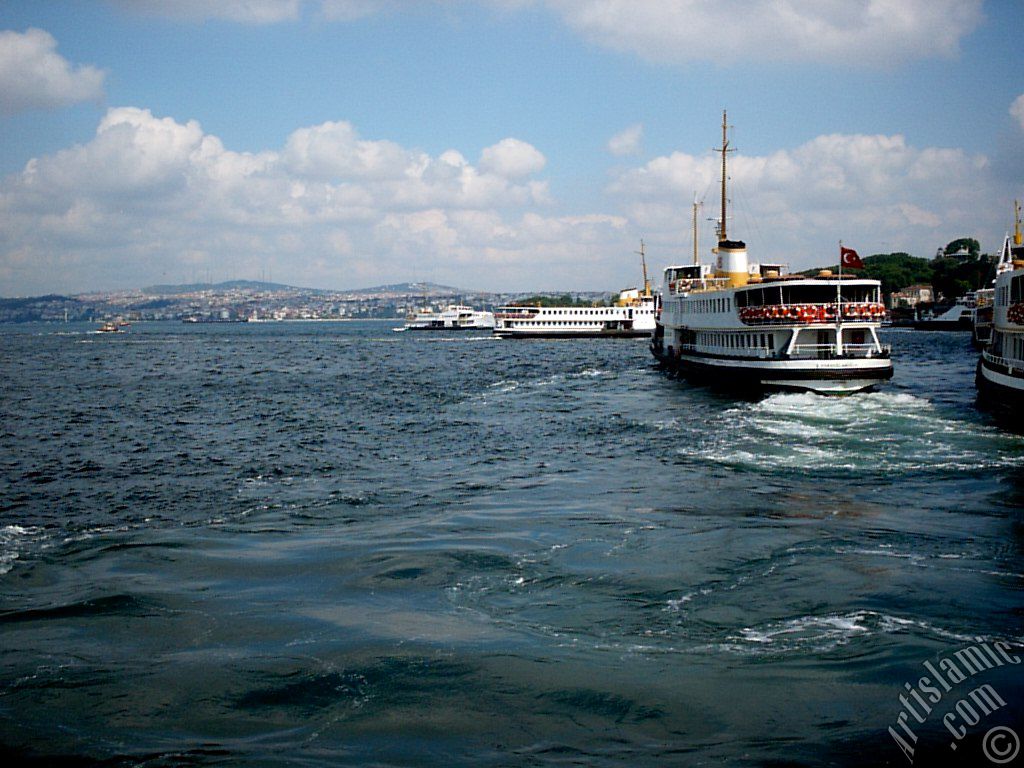 View of Eminonu shore and the ships from the sea in Istanbul city of Turkey.
