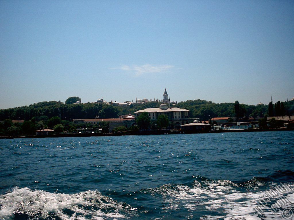 View of Sarayburnu coast, ships and Topkapi Palace from the sea in Istanbul city of Turkey.
