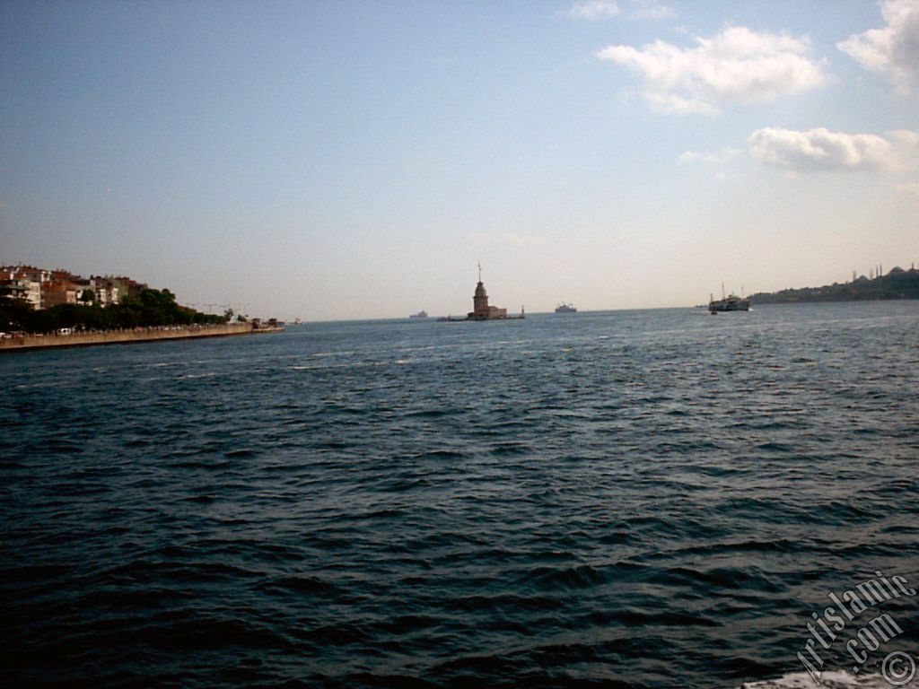 View of Uskudar coast, Kiz Kulesi (Maiden`s Tower) and Sarayburnu coast from the Bosphorus in Istanbul city of Turkey.

