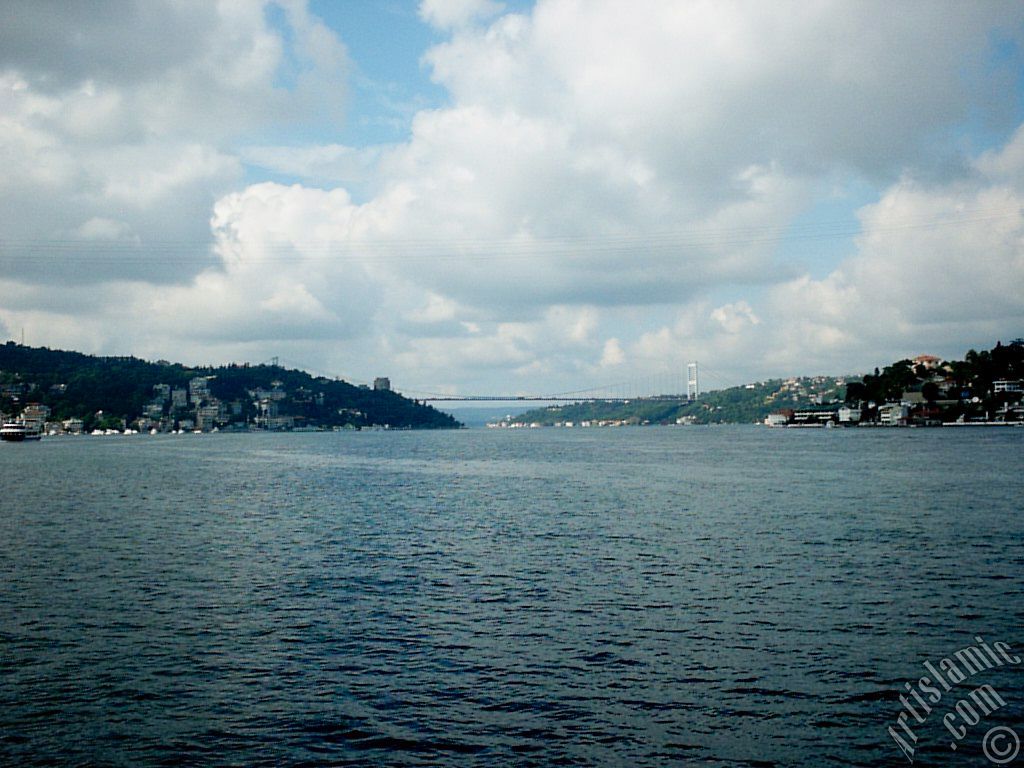 View towards Fatih Sultan Mehmet Bridge over the Bosphorus from between Arnavutkoy shore and Vanikoy shore in the middle of the Bosphorus in Istanbul city of Turkey.
