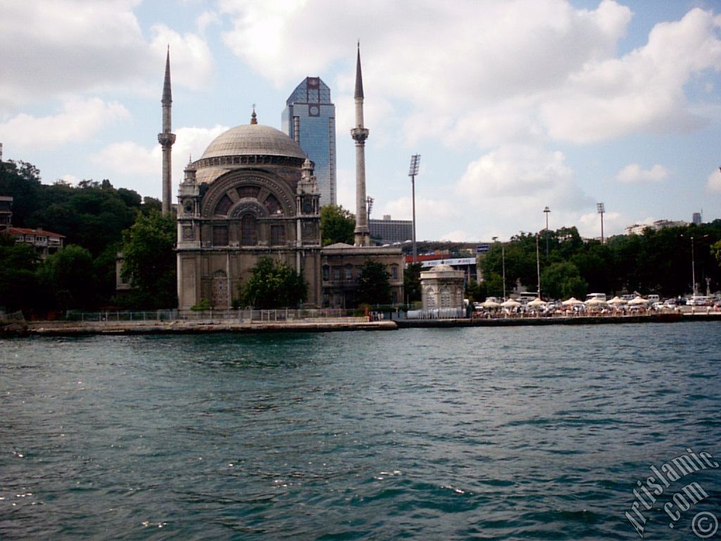 View of Dolmabahce coast and Valide Sultan Mosque from the Bosphorus in Istanbul city of Turkey.
