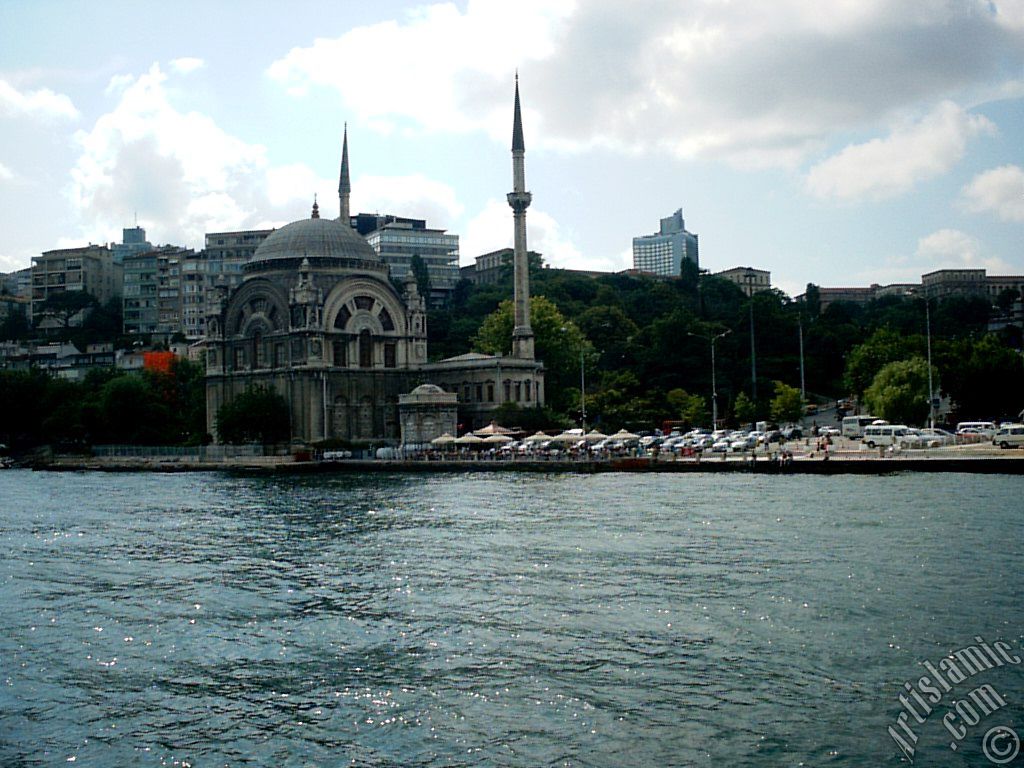 View of Dolmabahce coast and Valide Sultan Mosque from the Bosphorus in Istanbul city of Turkey.
