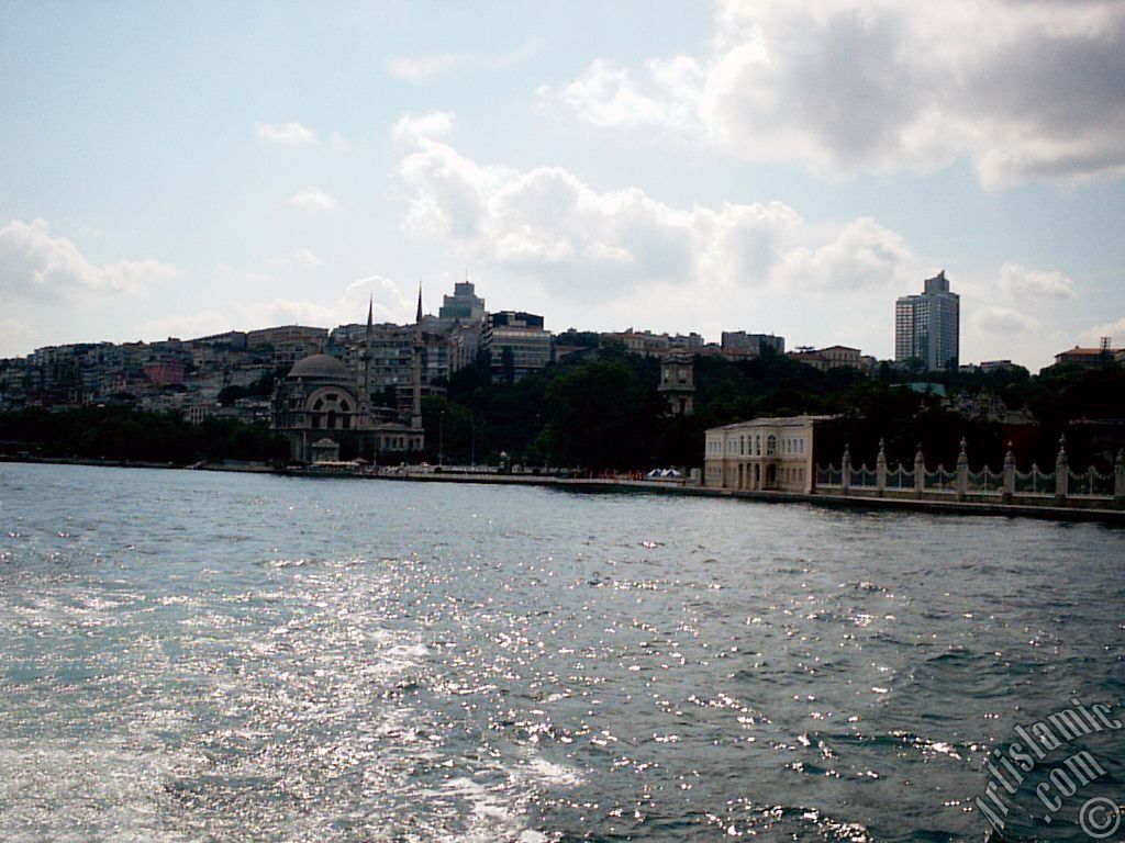 View of Dolmabahce Palace and Valide Sultan Mosque from the Bosphorus in Istanbul city of Turkey.
