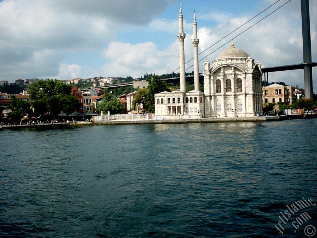 View of Ortakoy coast, Ortakoy Mosque and Bosphorus Bridge from the Bosphorus in Istanbul city of Turkey.

