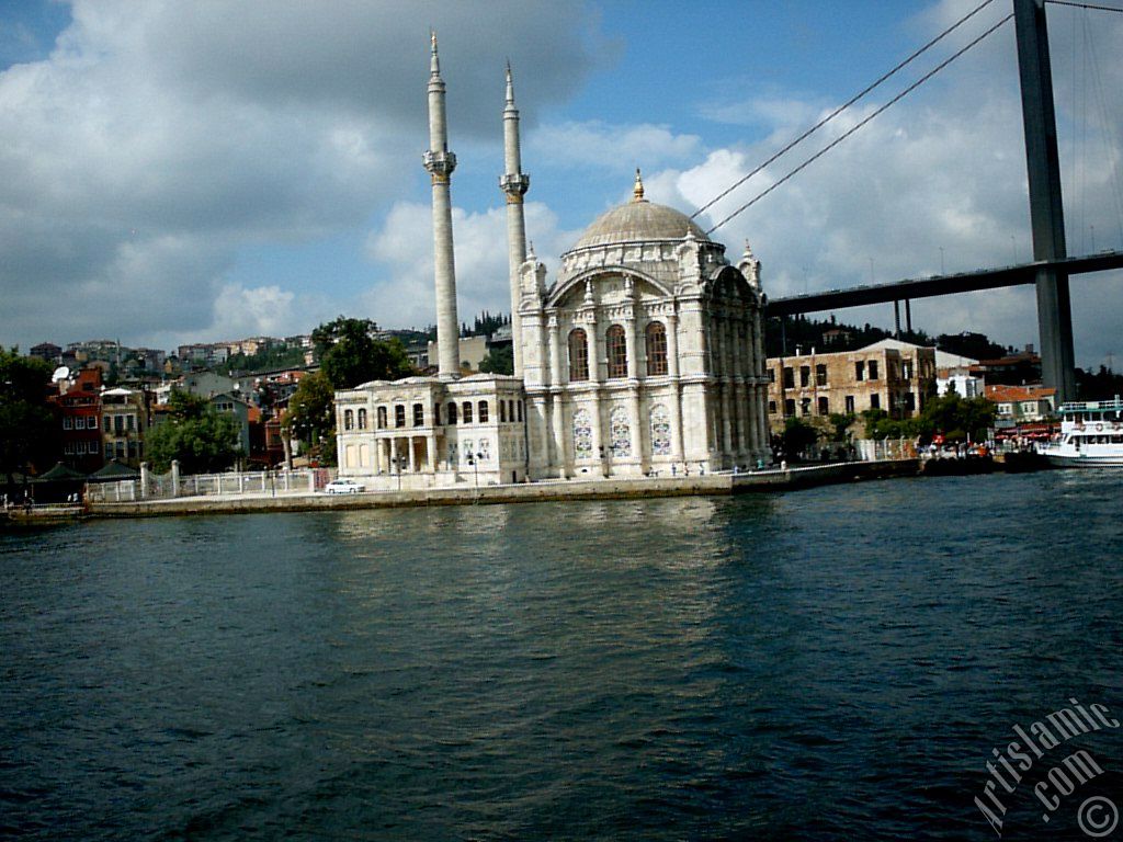 View of Ortakoy coast, Ortakoy Mosque and Bosphorus Bridge from the Bosphorus in Istanbul city of Turkey.
