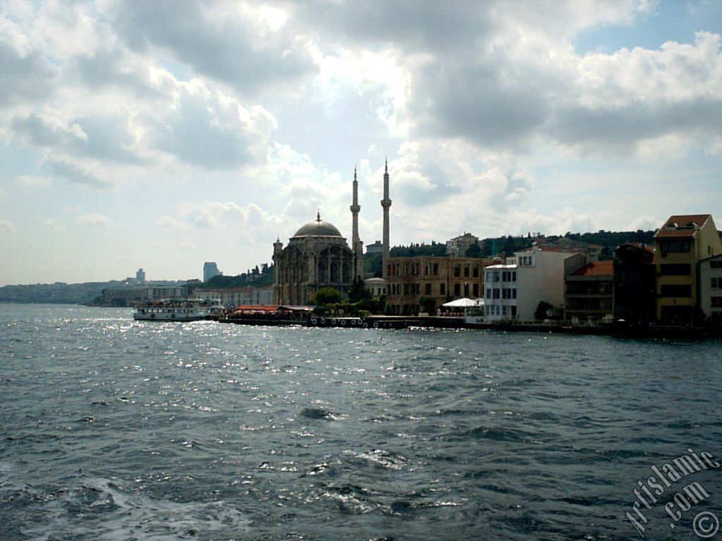 View of Ortakoy coast and Ortakoy Mosque from the Bosphorus in Istanbul city of Turkey.
