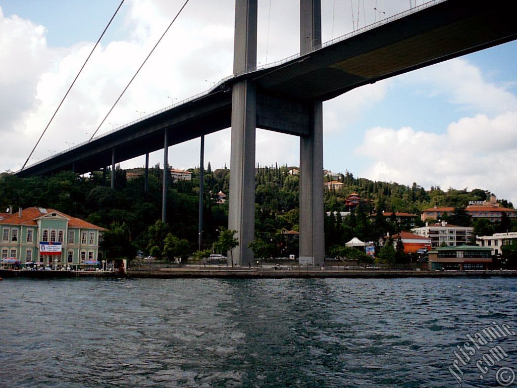 View of Ortakoy coast and Bosphorus Bridge from the Bosphorus in Istanbul city of Turkey.
