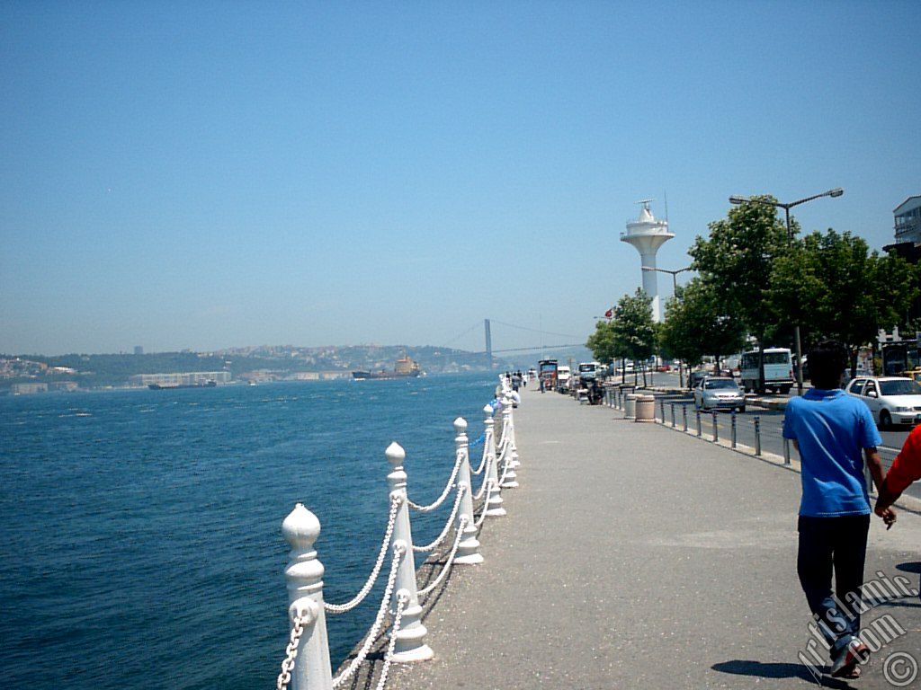 View of the shore and on the horizon Bosphorus Bridge from Uskudar district of Istanbul city of Turkey.
