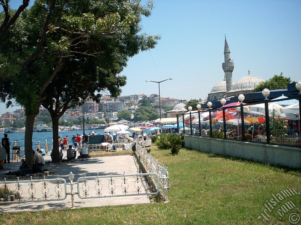 View of fishing people and Semsi Pasha Mosque made by Architect Sinan in Uskudar shore of Istanbul city of Turkey.

