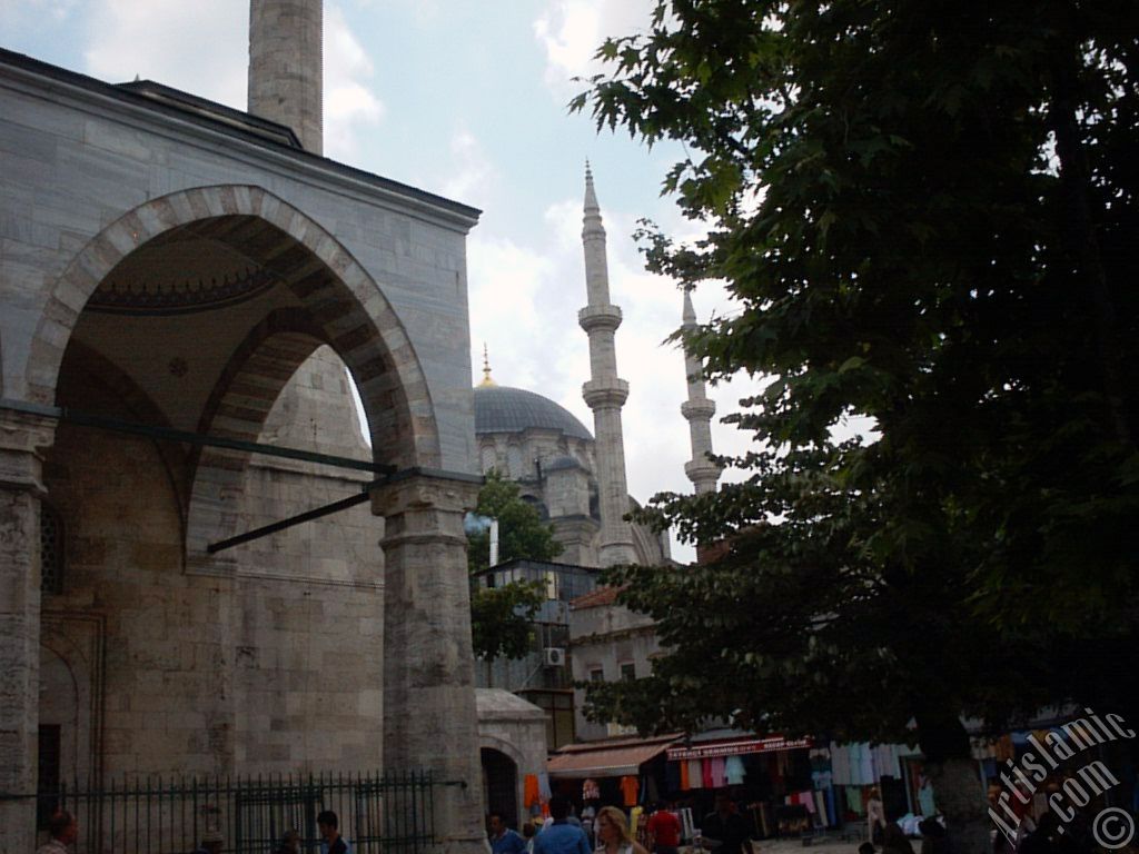 View of Nuruosmaniye Mosque from Mahmut Pasha Mosque`s outside court in Beyazit district in Istanbul city of Turkey.
