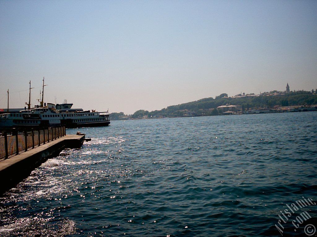 View of Karakoy jetty and Topkapi Palace from the shore of Karakoy in Istanbul city of Turkey.
