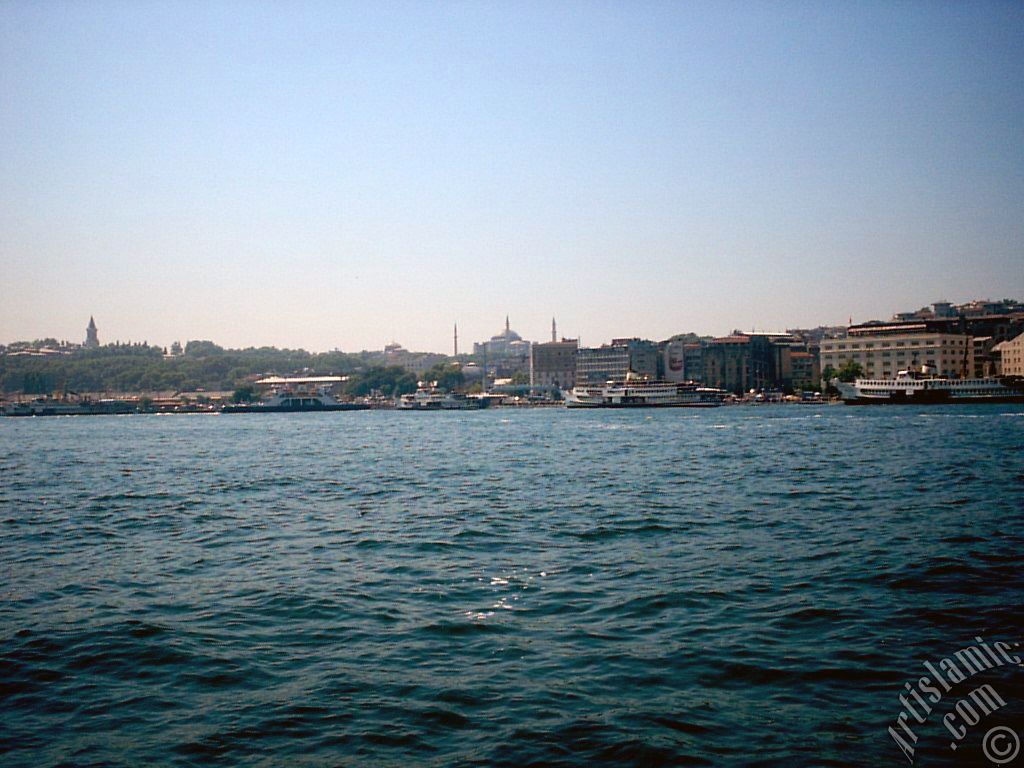 View of Eminonu coast, Ayasofya Mosque (Hagia Sophia) and Topkapi Palace from the shore of Karakoy in Istanbul city of Turkey.
