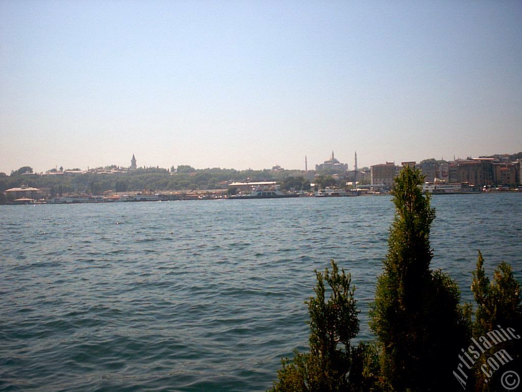 View of Eminonu coast, Ayasofya Mosque (Hagia Sophia) and Topkapi Palace from the shore of Karakoy in Istanbul city of Turkey.
