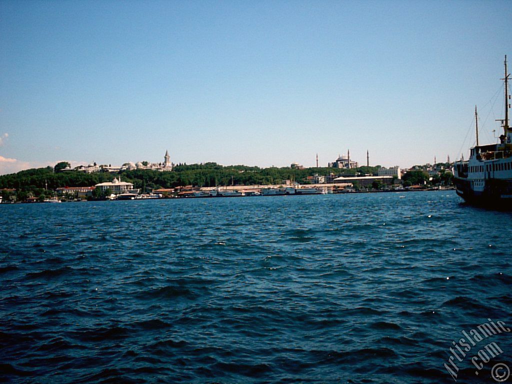View of Eminonu coast, Ayasofya Mosque (Hagia Sophia) and Topkapi Palace from the shore of Karakoy in Istanbul city of Turkey.
