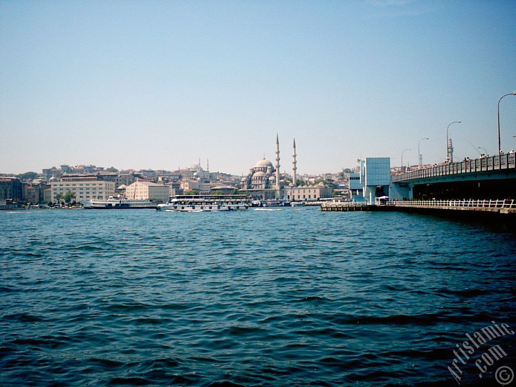 View of Eminonu coast, Sultan Ahmet Mosque and Yeni Cami (Mosque) from the shore of Karakoy in Istanbul city of Turkey.
