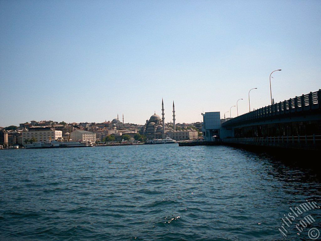 View of Eminonu coast, Sultan Ahmet Mosque and Yeni Cami (Mosque) from the shore of Karakoy in Istanbul city of Turkey.
