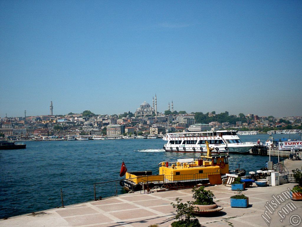 View of Eminonu coast, (from left) Beyazit Tower, (below) Rustem Pasha Mosque and (above) Suleymaniye Mosque from the shore of Karakoy-Persembe Pazari in Istanbul city of Turkey.
