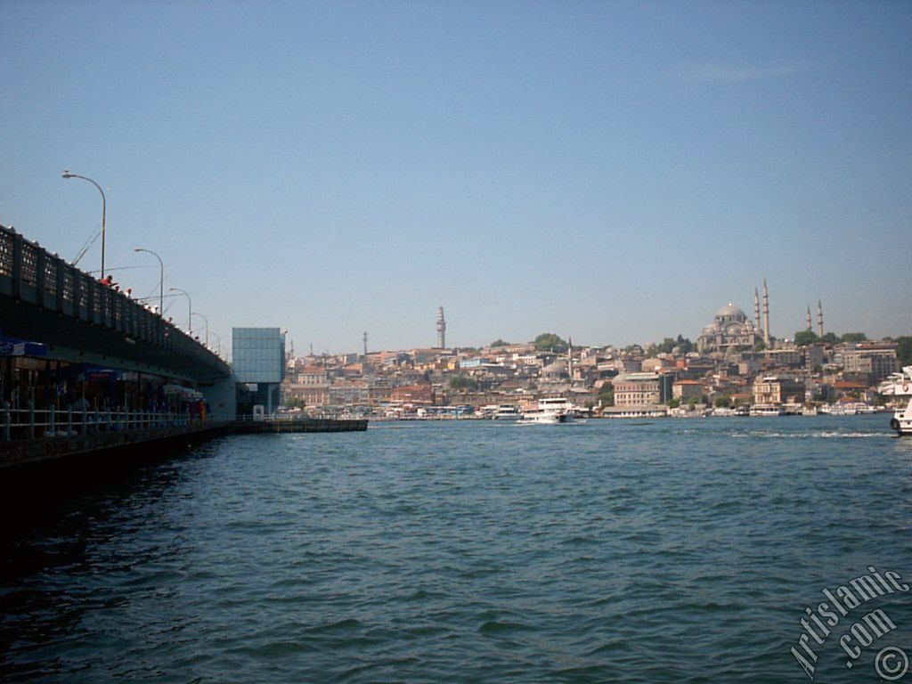 View of Eminonu coast, (from left) Galata Bridge, Beyazit Tower, (below) Rustem Pasha Mosque and (above) Suleymaniye Mosque from the shore of Karakoy-Persembe Pazari in Istanbul city of Turkey.
