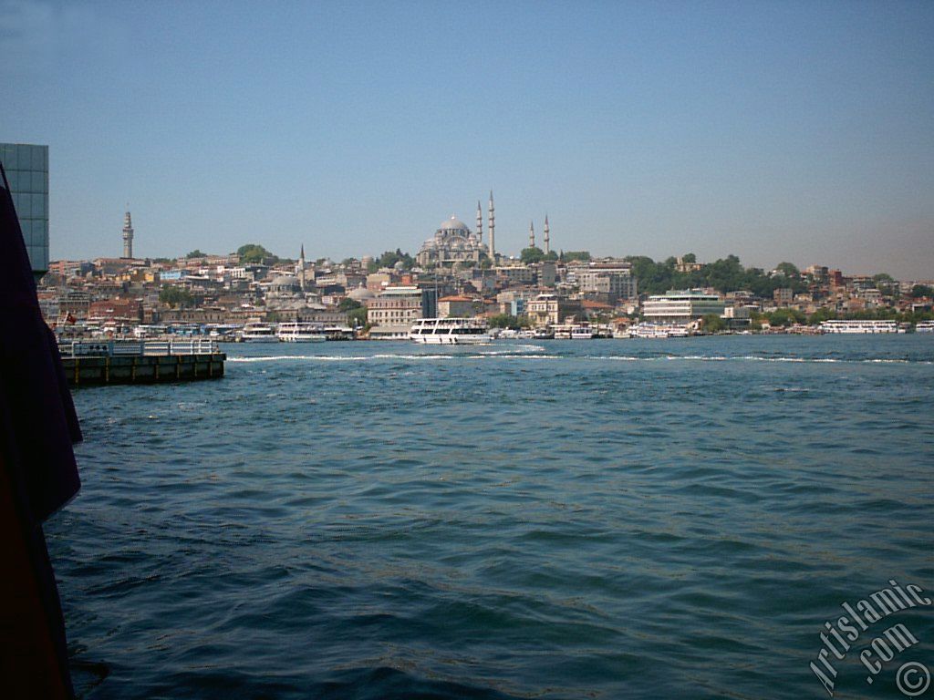 View of Eminonu coast, (from left) Beyazit Tower, (below) Rustem Pasha Mosque and (above) Suleymaniye Mosque from the shore of Karakoy-Persembe Pazari in Istanbul city of Turkey.
