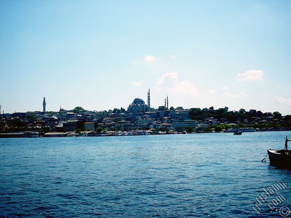 View of Eminonu coast, (from left) Beyazit Tower, (below) Rustem Pasha Mosque and (above) Suleymaniye Mosque from the shore of Karakoy-Persembe Pazari in Istanbul city of Turkey.
