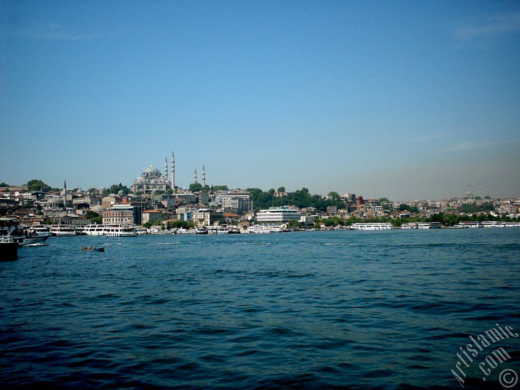 View of Eminonu coast, Rustem Pasha Mosque (at below left), (above) Suleymaniye Mosque and (on the horizon right) Fatih Mosque from the shore of Karakoy-Persembe Pazari in Istanbul city of Turkey.
