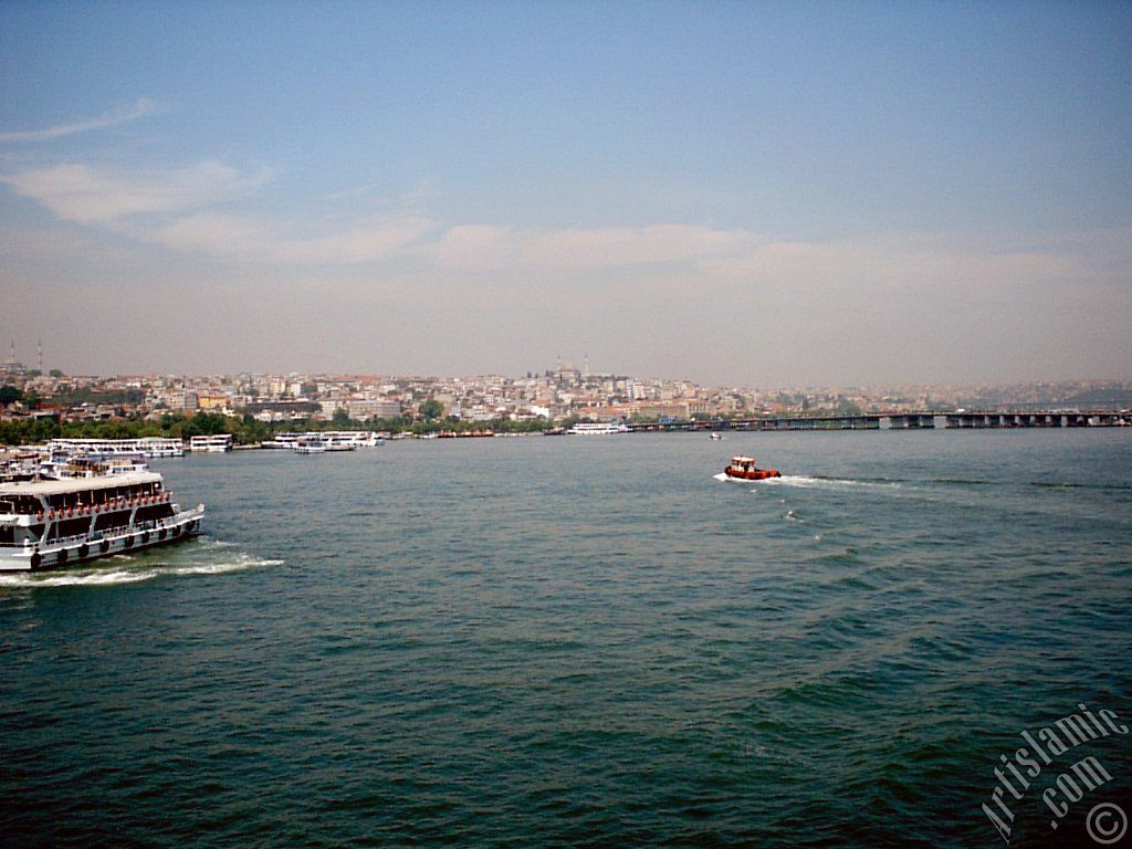 View of Sarachane coast, on the horizon on the left Fatih Mosque and in the middle Yavuz Sultan Selim Mosque from Galata Bridge located in Istanbul city of Turkey.
