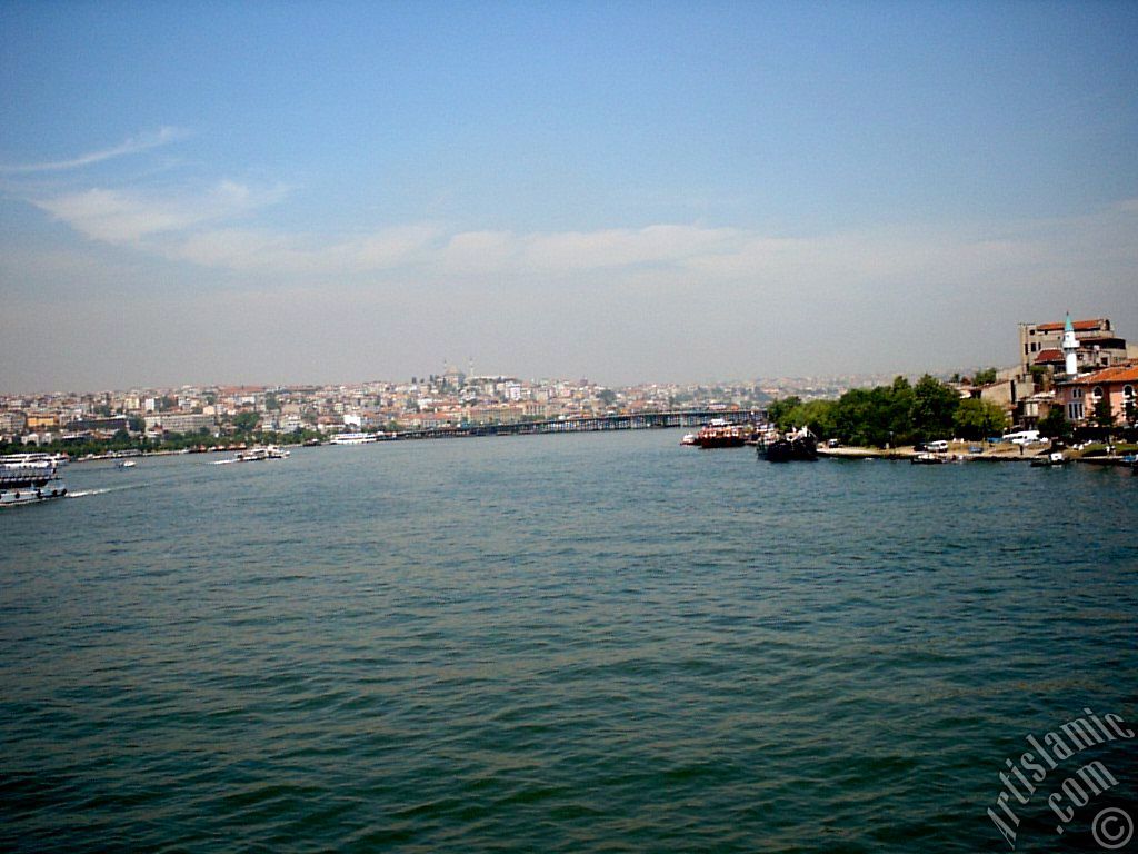 View towards Sarachane coast, on the horizon Yavuz Sultan Selim Mosque and on the right a small mosque from under Galata Bridge located in Istanbul city of Turkey.
