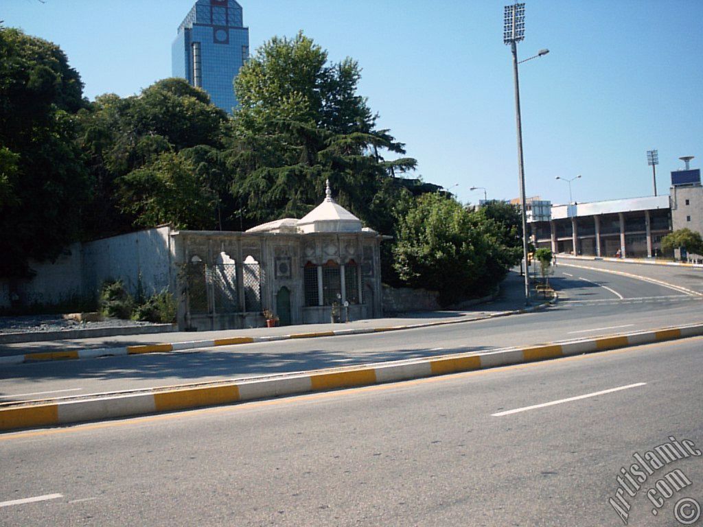 View of an Ottoman kiosk and footbal stadium in Dolmabahce district in Istanbul city of Turkey.
