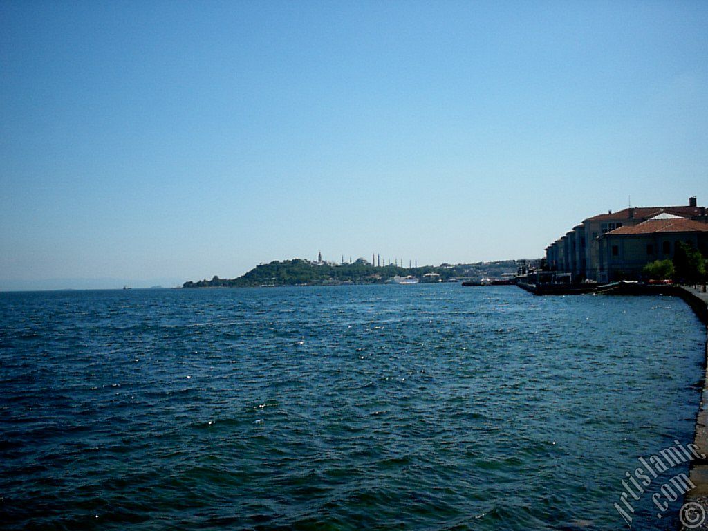 View towards Sarayburnu coast, Topkapi Palace, Ayasofya Mosque (Hagia Sophia) and  Sultan Ahmet Mosque (Blue Mosque) from a park at Kabatas shore in Istanbul city of Turkey.
