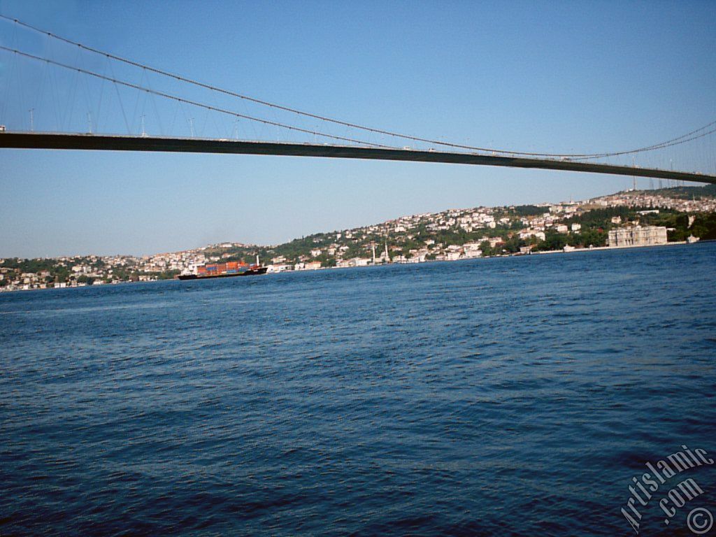 View of Bosphorus Bridge and Beylerbeyi coast from a park at Ortakoy shore in Istanbul city of Turkey.
